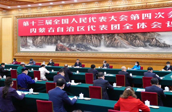 2021年3月5日，习近平总书记参加十三届全国人大四次会议内蒙古代表团的审议。
